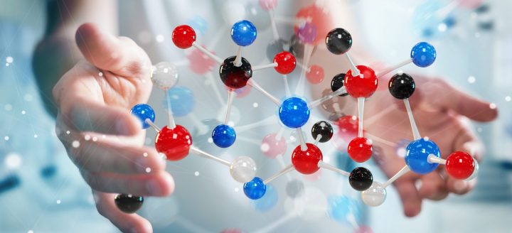 Businessman on blurred background using modern molecule structure 3D rendering